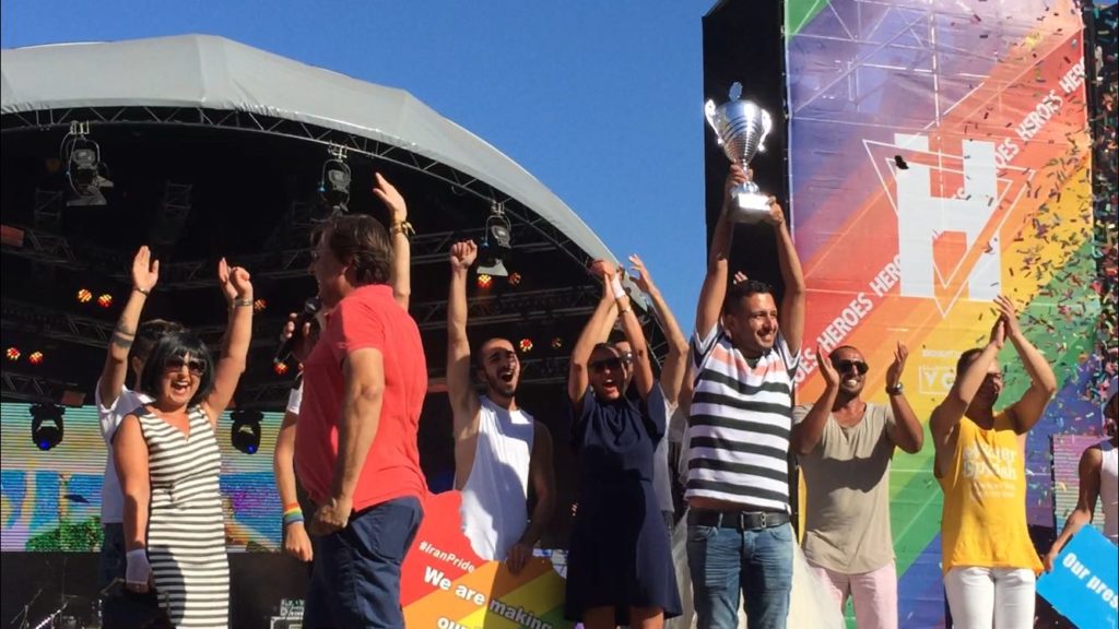 Raham Rafiee received the Iran Boat's award at Amsterdam Pride closing ceremony