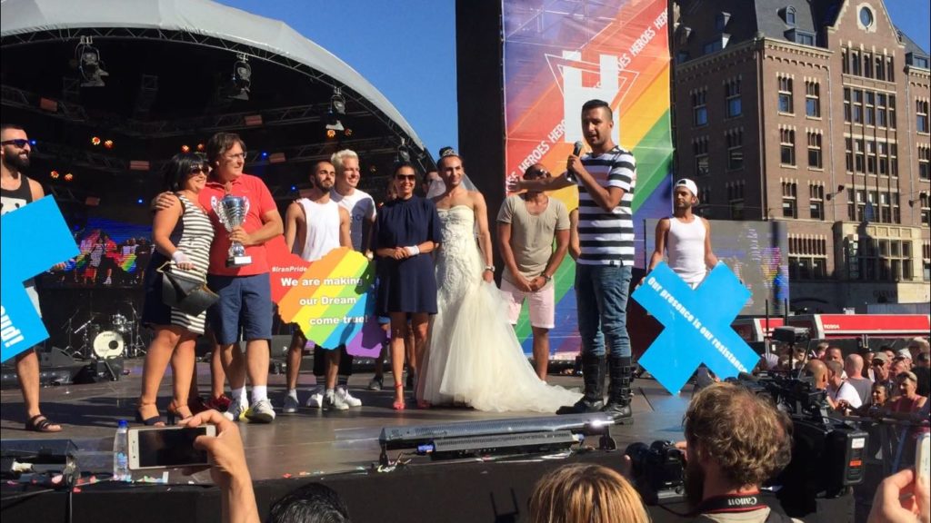 Raham Rafiee speaking at the Amsterdam Pride closing ceremony